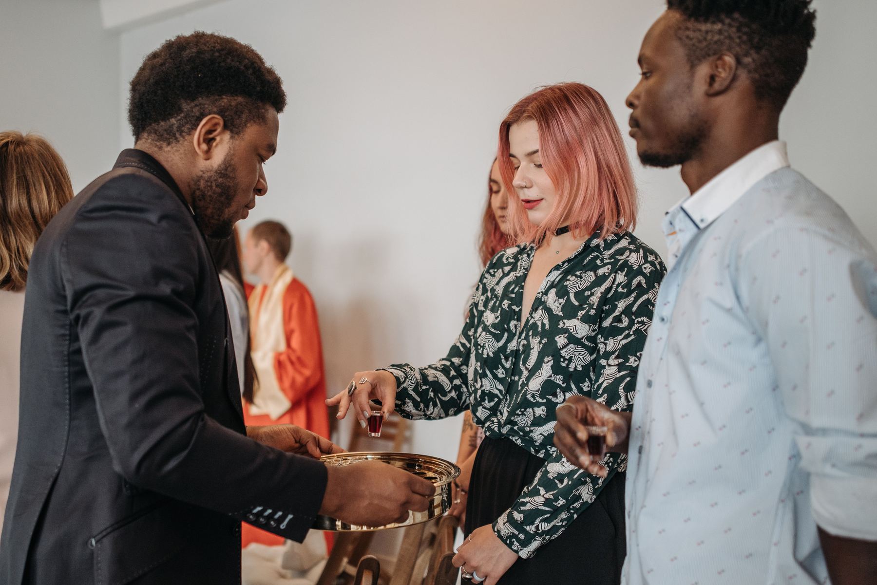 A community group sharing communion together
